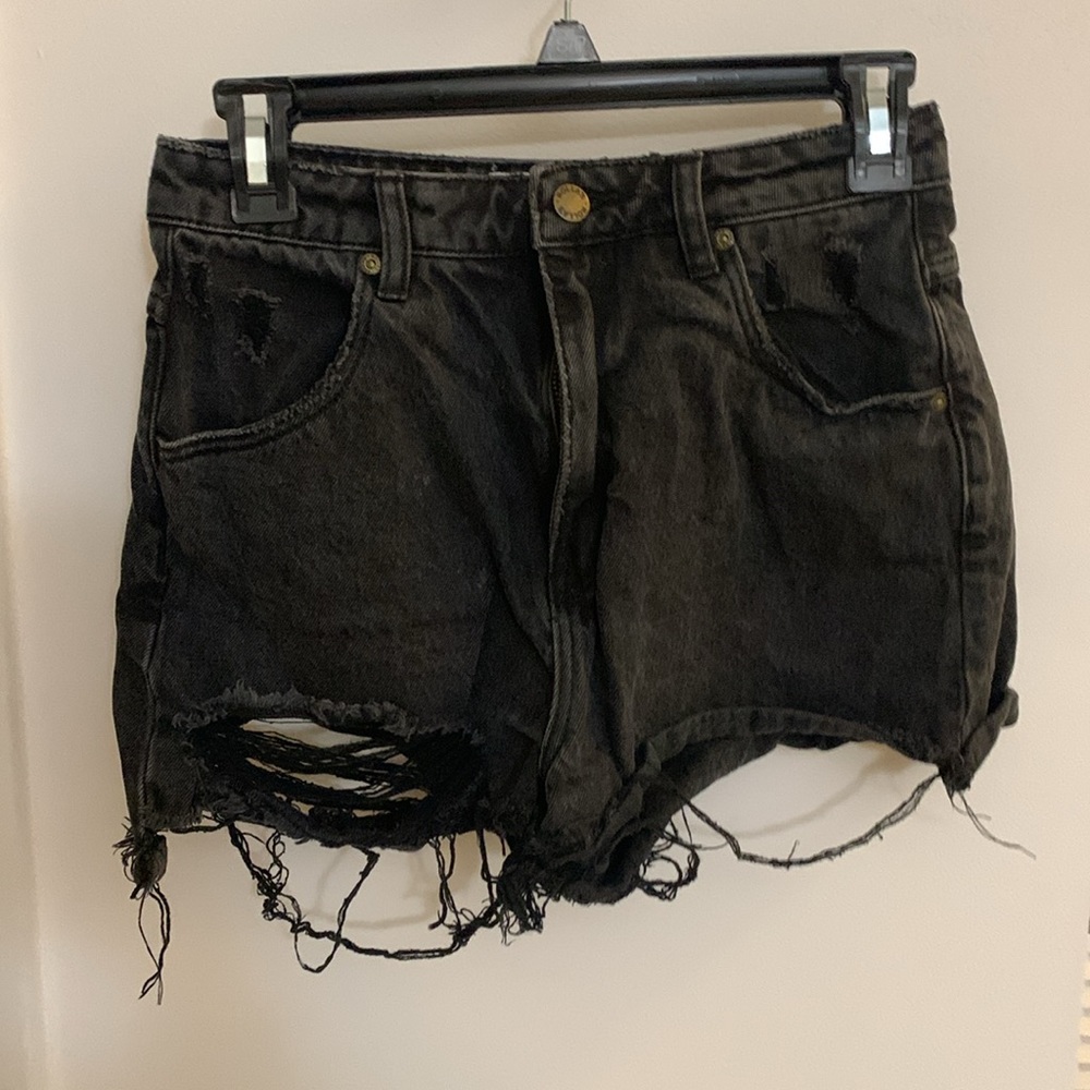 Rolla’s black denim distressed shorts sized 26